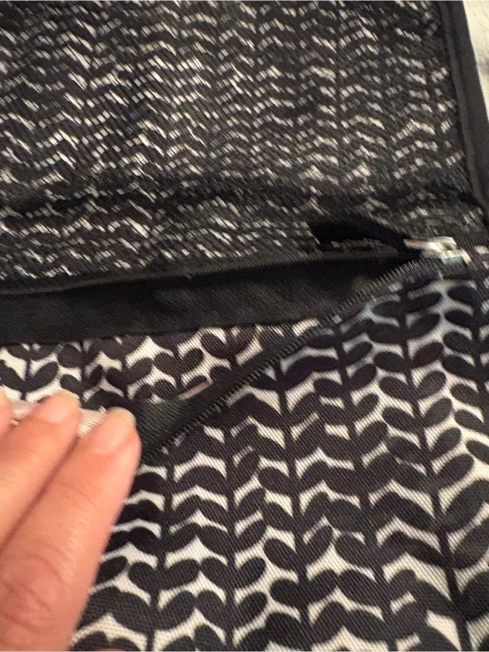 Skidaddle by Skip Hop Black & White Travel diaper bag with fold out changing pad